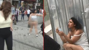 Bir kadın, gözaltına alınmamak için soyundu!